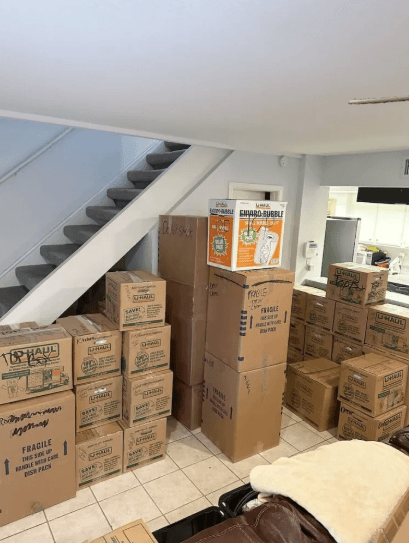 Full-home packing job with boxes organized throughout Miami-Dade property